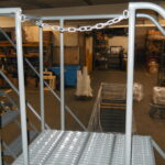 Side chain for rolling ladder